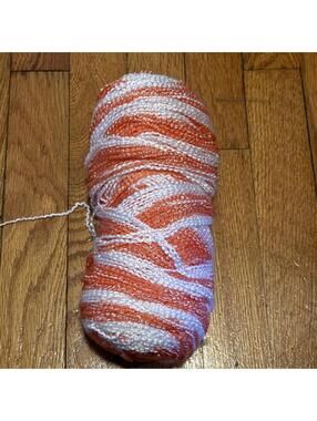 One Orange and White Variegated Knitting Yarn Skein